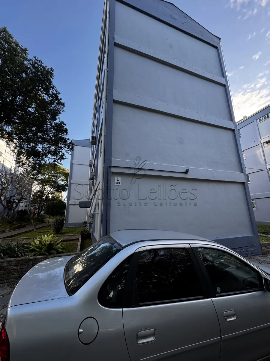 LOTE 000 - LEILÃO JUDICIAL DE UM APARTAMENTO SITUADO EM PORTO ALEGRE/RS, POSSUINDO 3 DORMITÓRIOS COM ÁREA PRIVATIVA DE 61,00 m2 E ÁREA TOTAL DE 68,00 m2.