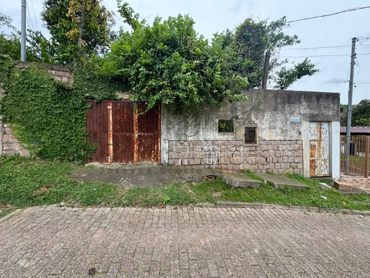 LOTE 000 - UM IMÓVEL LOCALIZADO EM PORTO ALEGRE NA RUA DONA FIRMINA, 1254, BAIRRO SÃO JOSÉ,  MEDINDO 9,90m  DE FRENTE POR 56,50m DE EXTENSÃO DA FRENTE AO FUNDO