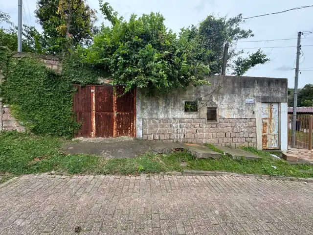 UM IMÓVEL LOCALIZADO EM PORTO ALEGRE NA RUA DONA FIRMINA, 1254, BAIRRO SÃO JOSÉ,  MEDINDO 9,90m  DE FRENTE POR 56,50m DE EXTENSÃO DA FRENTE AO FUNDO